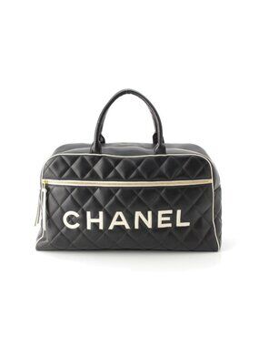 Chanel Quilted Logo Lambskin Boston Bag Black White